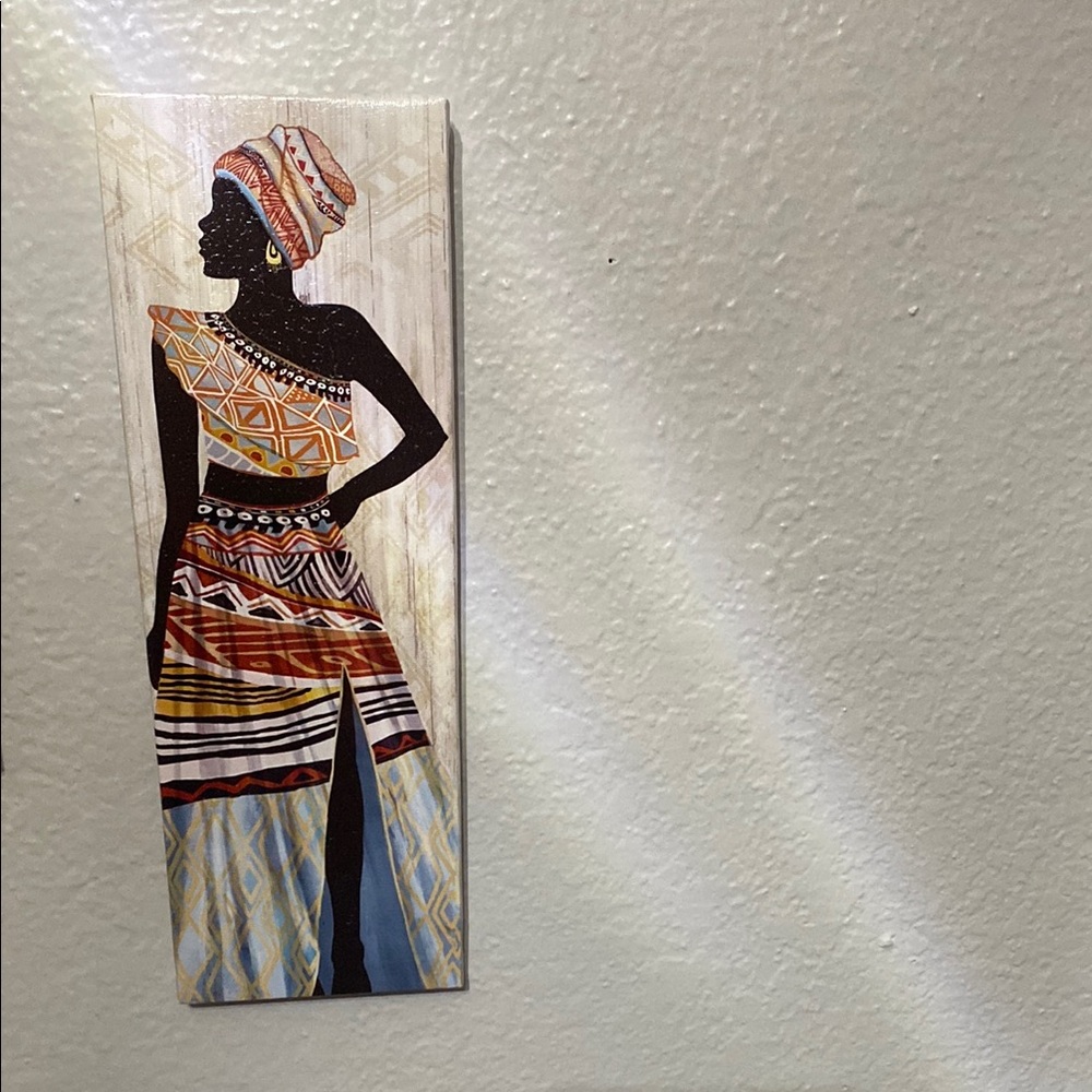 African Silhouette Canvas Art - Black Figure with Colorful Attire